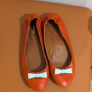 Fendi Orange Flats with White Bow Accent